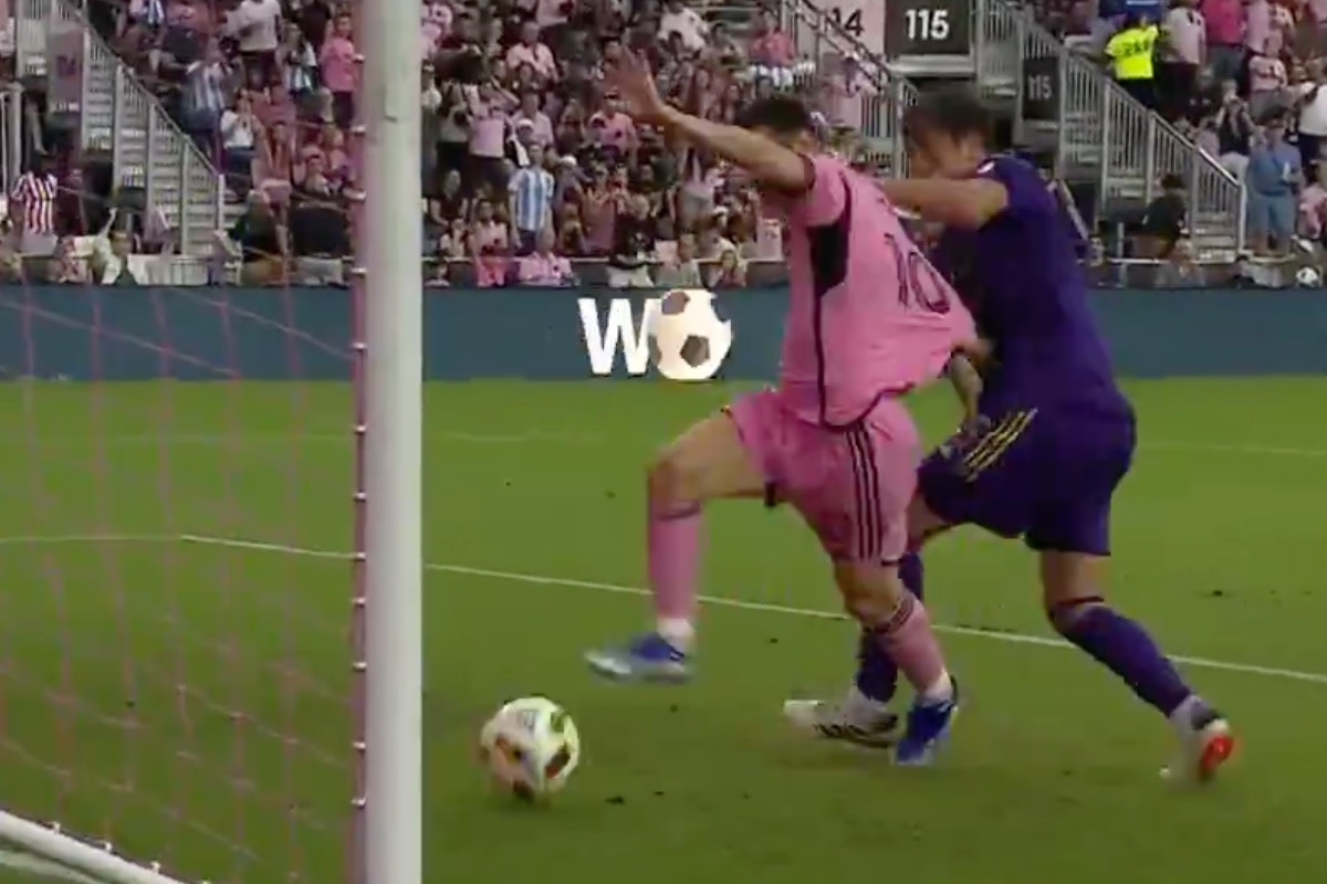 Rodrigo Schlegel pictured (right) pulling the jersey of Lionel Messi in an unsuccessful effort to stop the Inter Miami captain from scoring against Orlando City in an MLS game in March 2024